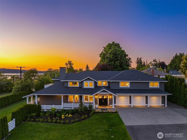 6006 SE 30th St, Mercer Island, WA 98040 - view of front facade with a chimney, concrete driveway, a porch, and a front yard