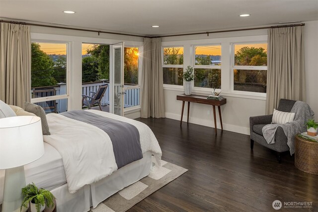 6006 SE 30th St, Mercer Island, WA 98040 - bedroom with dark wood-style flooring, multiple windows, baseboards, and recessed lighting