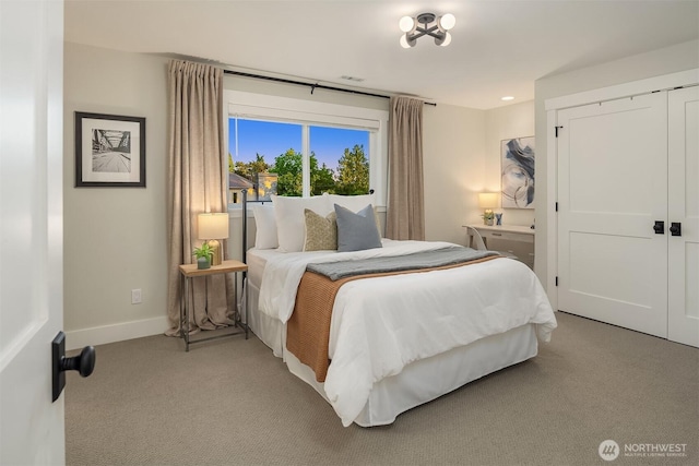6006 SE 30th St, Mercer Island, WA 98040 - bedroom featuring light carpet, baseboards, and a closet