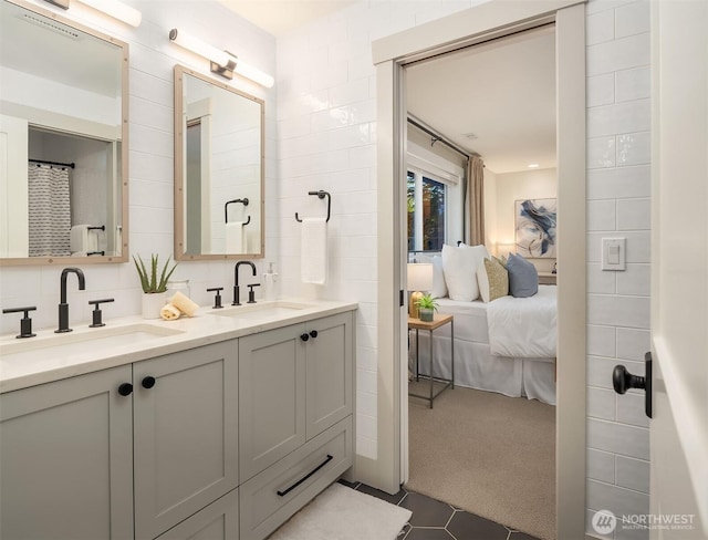 6006 SE 30th St, Mercer Island, WA 98040 - bathroom with ensuite bathroom, double vanity, tile patterned floors, and backsplash