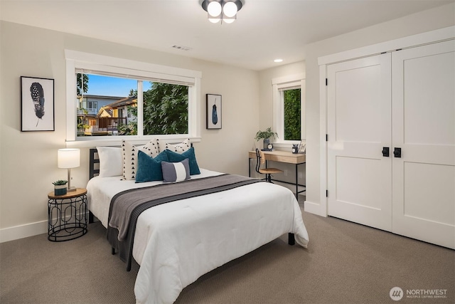 6006 SE 30th St, Mercer Island, WA 98040 - carpeted bedroom featuring multiple windows, baseboards, a closet, and recessed lighting