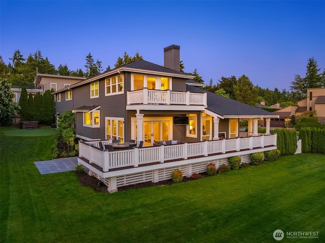 6006 SE 30th St, Mercer Island, WA 98040 - rear view of house with a chimney, a lawn, and a deck