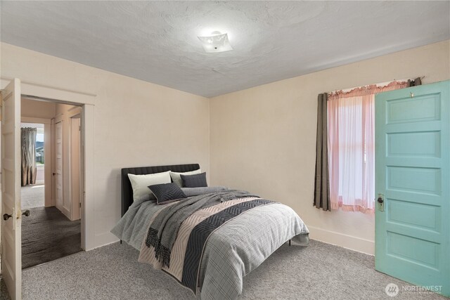 504 W 4th St, Aberdeen, WA 98520 - bedroom featuring carpet and baseboards