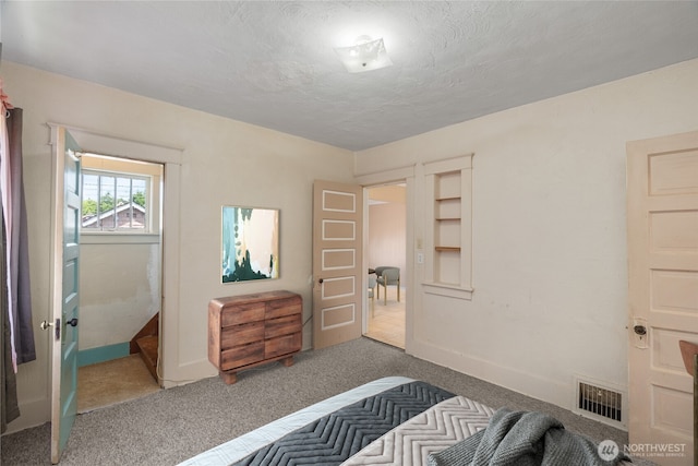 504 W 4th St, Aberdeen, WA 98520 - bedroom featuring carpet floors, a textured ceiling, and baseboards