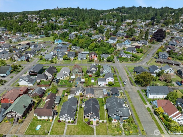 504 W 4th St, Aberdeen, WA 98520 - aerial view of property and surrounding area featuring nearby suburban area