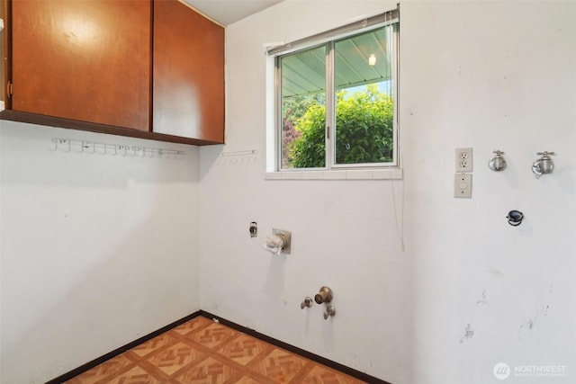 32427 6th Ave, Black Diamond, WA 98010 - laundry area featuring cabinet space and baseboards