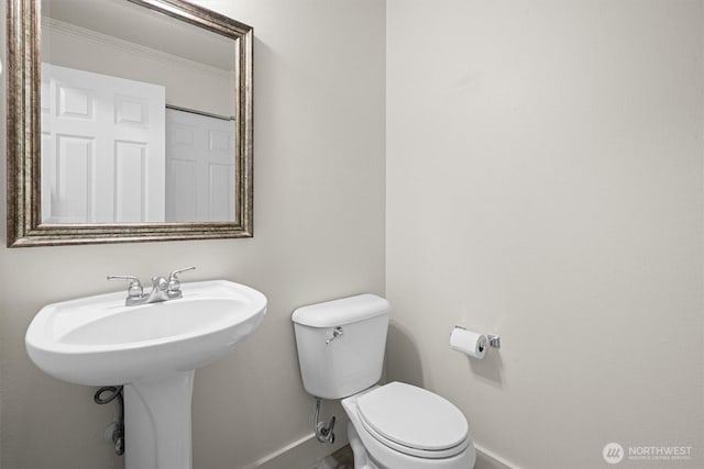 13901 Cedar Ct, Sultan, WA 98294 - half bath with baseboards, toilet, and crown molding