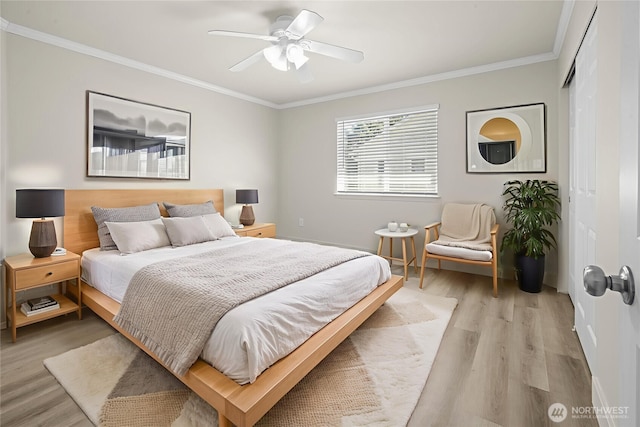 13901 Cedar Ct, Sultan, WA 98294 - bedroom with light wood finished floors, crown molding, a closet, ceiling fan, and baseboards