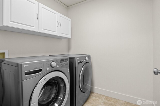 13901 Cedar Ct, Sultan, WA 98294 - laundry room featuring cabinet space, washer and dryer, baseboards, light tile patterned flooring, and ornamental molding