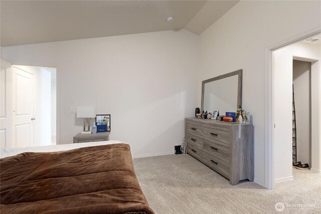 7 Patty Cir, Milton-Freewater, OR 97862 - bedroom featuring light colored carpet, lofted ceiling, and baseboards