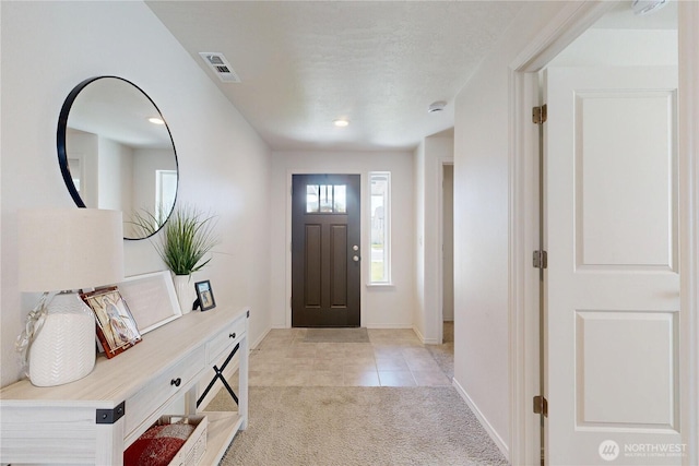 7 Patty Cir, Milton-Freewater, OR 97862 - entryway with light colored carpet, light tile patterned floors, baseboards, and recessed lighting