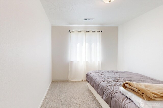 7 Patty Cir, Milton-Freewater, OR 97862 - bedroom featuring light carpet and baseboards