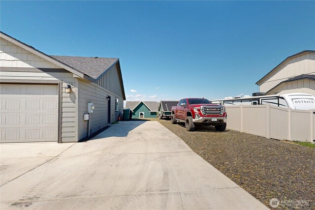 7 Patty Cir, Milton-Freewater, OR 97862 - view of property exterior with concrete driveway and roof with shingles