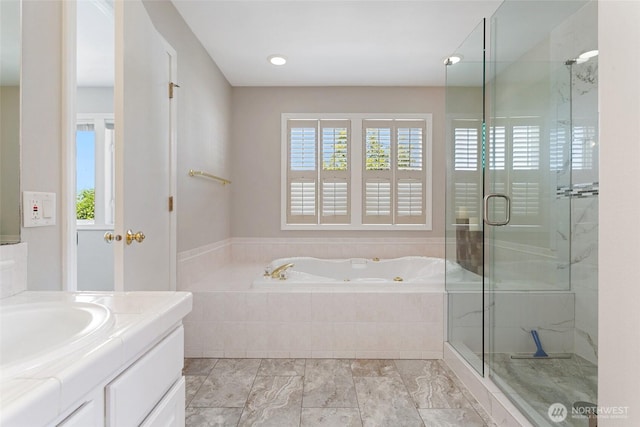 1022 S 225th Ln, Des Moines, WA 98198 - full bath with a garden tub, vanity, a stall shower, and marble finish flooring
