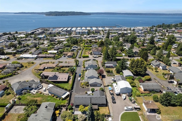 1022 S 225th Ln, Des Moines, WA 98198 - aerial view of property and surrounding area featuring a large body of water and nearby suburban area