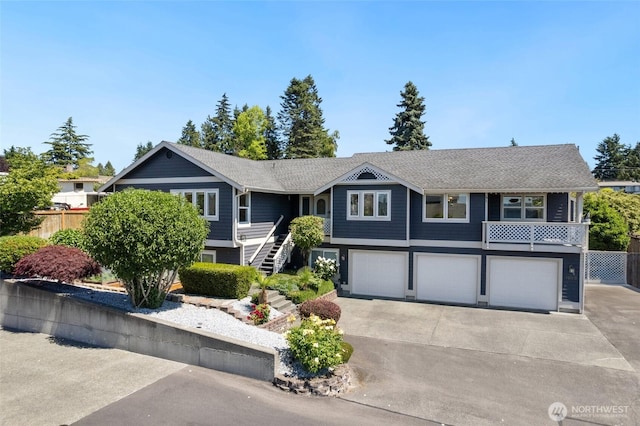 1022 S 225th Ln, Des Moines, WA 98198 - view of front facade with an attached garage, driveway, and stairs