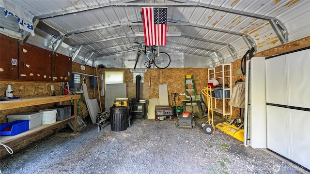 136 Tamarack Ln, Dayton, WA 99328 - garage with a wood stove and metal wall