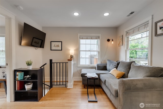 9741 Densmore Ave N, Seattle, WA 98103 - living area featuring light wood-style floors, plenty of natural light, and recessed lighting