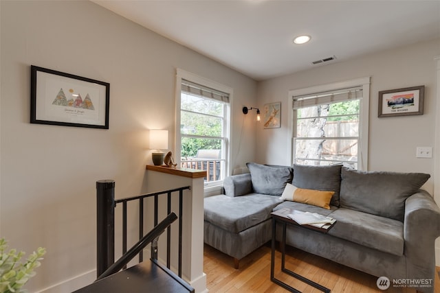 9741 Densmore Ave N, Seattle, WA 98103 - living area with light wood finished floors, healthy amount of natural light, and recessed lighting