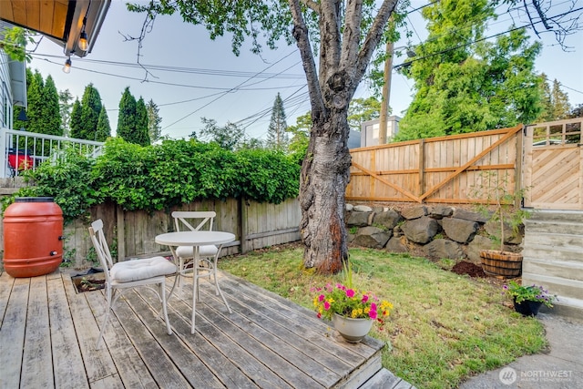 9741 Densmore Ave N, Seattle, WA 98103 - wooden terrace featuring a fenced backyard