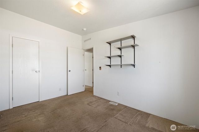7220 E Belmont St, Othello, WA 99344 - unfurnished bedroom featuring carpet floors