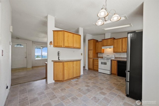 7220 E Belmont St, Othello, WA 99344 - kitchen with white electric range, freestanding refrigerator, under cabinet range hood, dishwasher, and light countertops