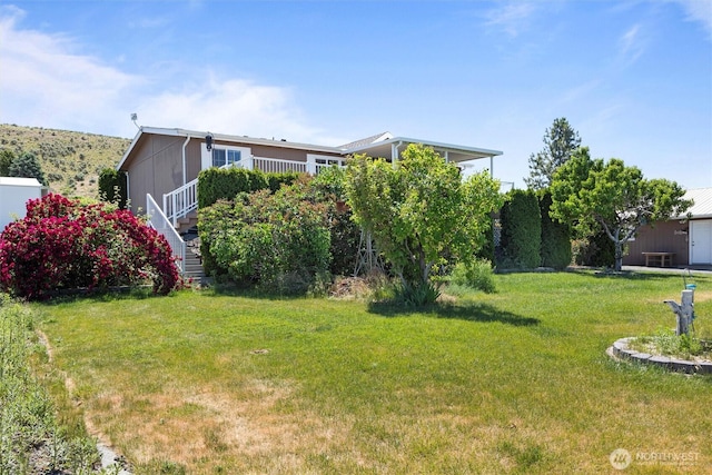7220 E Belmont St, Othello, WA 99344 - view of grassy yard with stairs