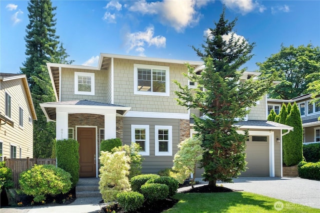 8910 125th Ln NE, Kirkland, WA 98033 - view of front of home with stone siding and driveway
