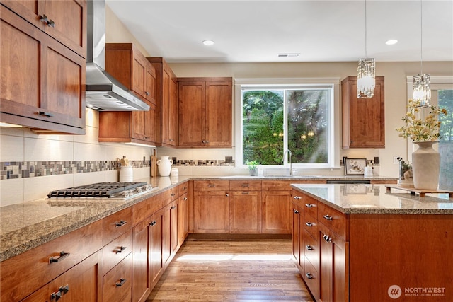 8910 125th Ln NE, Kirkland, WA 98033 - kitchen featuring wall chimney exhaust hood, stainless steel gas cooktop, plenty of natural light, light wood-type flooring, and recessed lighting