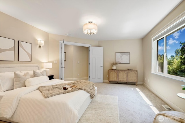 8910 125th Ln NE, Kirkland, WA 98033 - bedroom featuring light colored carpet and baseboards