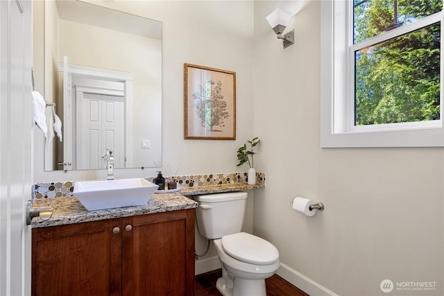8910 125th Ln NE, Kirkland, WA 98033 - half bathroom with plenty of natural light, vanity, and wood finished floors