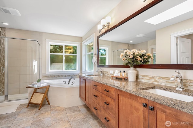 8910 125th Ln NE, Kirkland, WA 98033 - bathroom with double vanity, a garden tub, and a stall shower