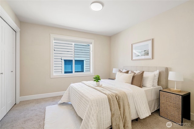 8910 125th Ln NE, Kirkland, WA 98033 - carpeted bedroom with baseboards and a closet