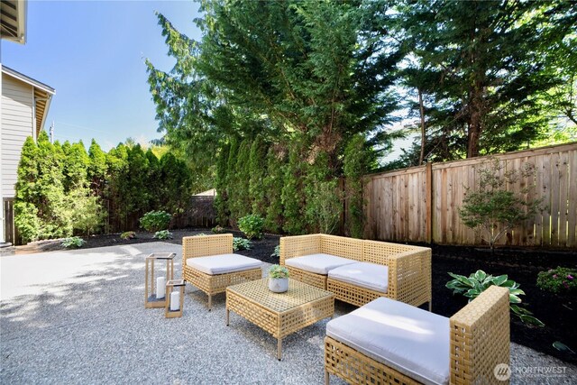 8910 125th Ln NE, Kirkland, WA 98033 - fenced backyard featuring a patio