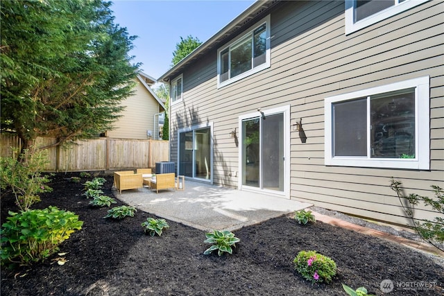 8910 125th Ln NE, Kirkland, WA 98033 - rear view of house featuring a patio and an outdoor hangout area