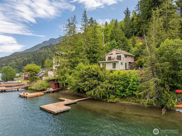 49 Sunny Point Ln, Port Angeles, WA 98363 - dock featuring a wooded view, a water and mountain view, and a balcony