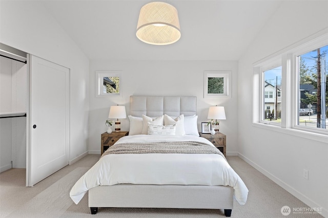 8017 126th Ave NE Unit B, Kirkland, WA 98033 - bedroom with light carpet, lofted ceiling, and baseboards