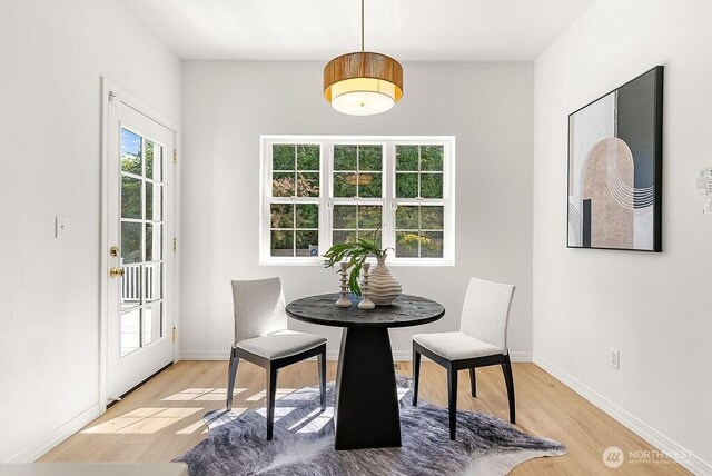 24212 112th Ave SE, Kent, WA 98030 - dining area featuring light wood-style floors and baseboards