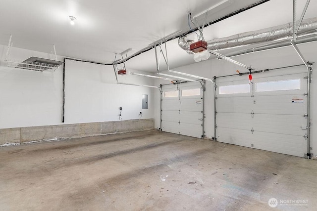 24212 112th Ave SE, Kent, WA 98030 - garage featuring electric panel and a garage door opener