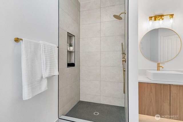 24212 112th Ave SE, Kent, WA 98030 - bathroom featuring a tile shower and vanity