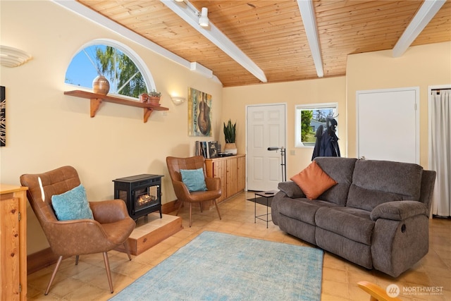 2514 Haines St, Port Townsend, WA 98368 - tiled living room featuring a wood stove and wood ceiling
