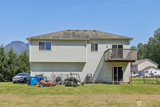 38431 147th St SE, Gold Bar, WA 98251 - back of house featuring a yard, a balcony, and a mountain view