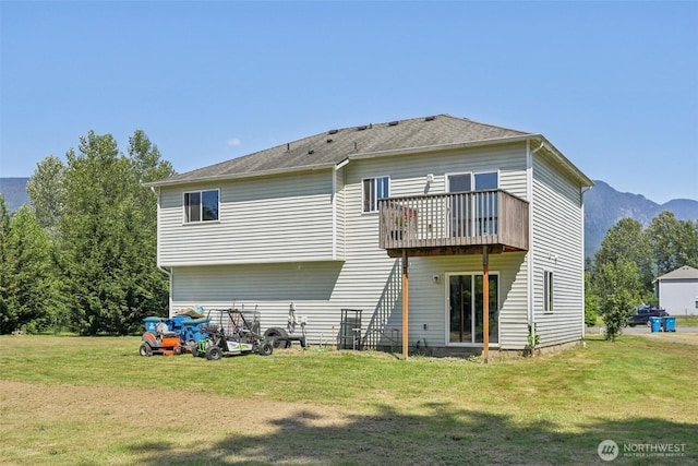 38431 147th St SE, Gold Bar, WA 98251 - back of property with a yard, a mountain view, and a balcony