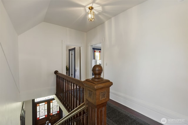 925 Wilson St, Port Townsend, WA 98368 - stairs with vaulted ceiling, baseboards, and wood finished floors