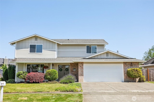 6413 152nd Ave E, Sumner, WA 98390 - view of front of property with driveway, board and batten siding, roof with shingles, and brick siding