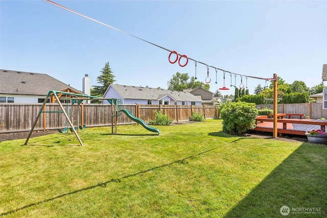 6413 152nd Ave E, Sumner, WA 98390 - view of yard with a playground and a deck