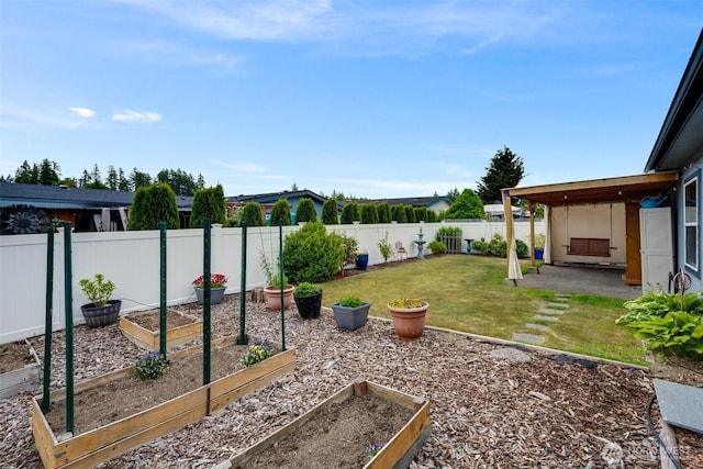 716 Dennis St SE Unit 93, Tumwater, WA 98501 - fenced backyard with a garden and a patio area