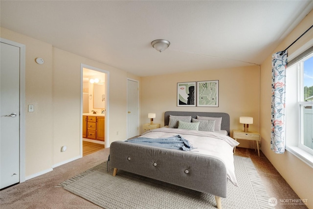 716 Dennis St SE Unit 93, Tumwater, WA 98501 - bedroom featuring light carpet and connected bathroom
