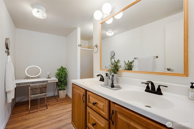 716 Dennis St SE Unit 93, Tumwater, WA 98501 - full bathroom featuring double vanity, wood finished floors, and a shower