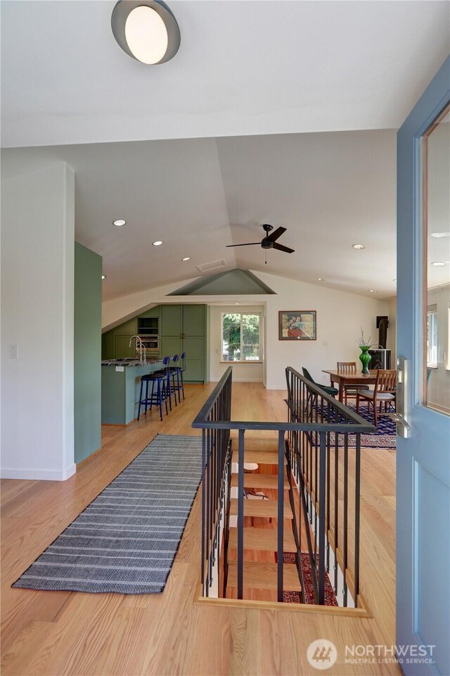 905 Bywater Way, Port Ludlow, WA 98365 - stairs with wood finished floors, vaulted ceiling, and a ceiling fan